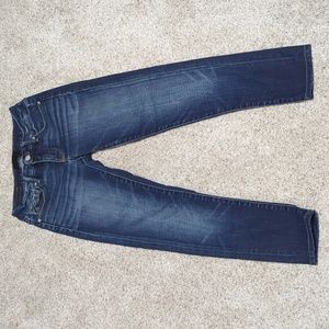 Buckle black skinny jeans